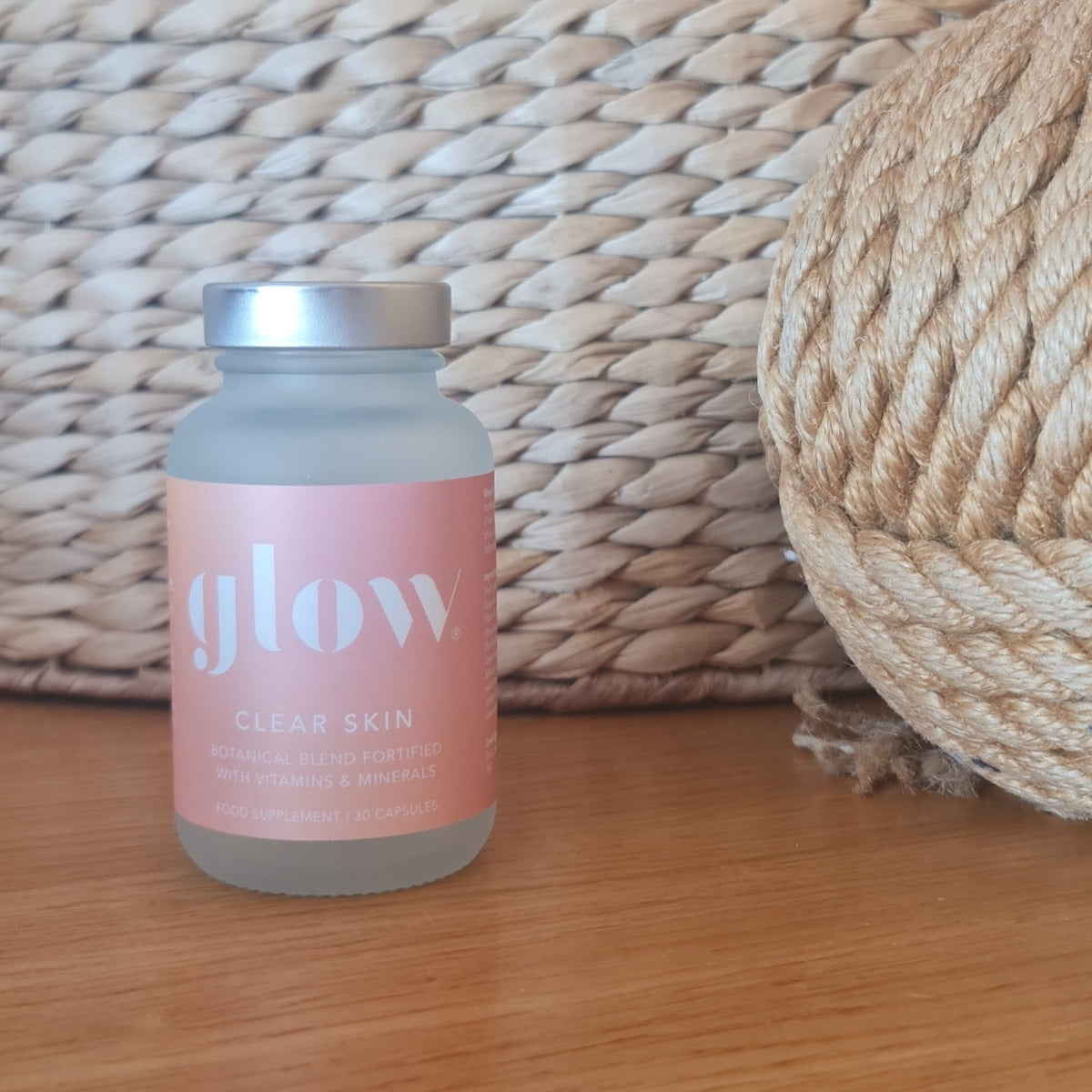 Glow clear skin in front of a wicker basket